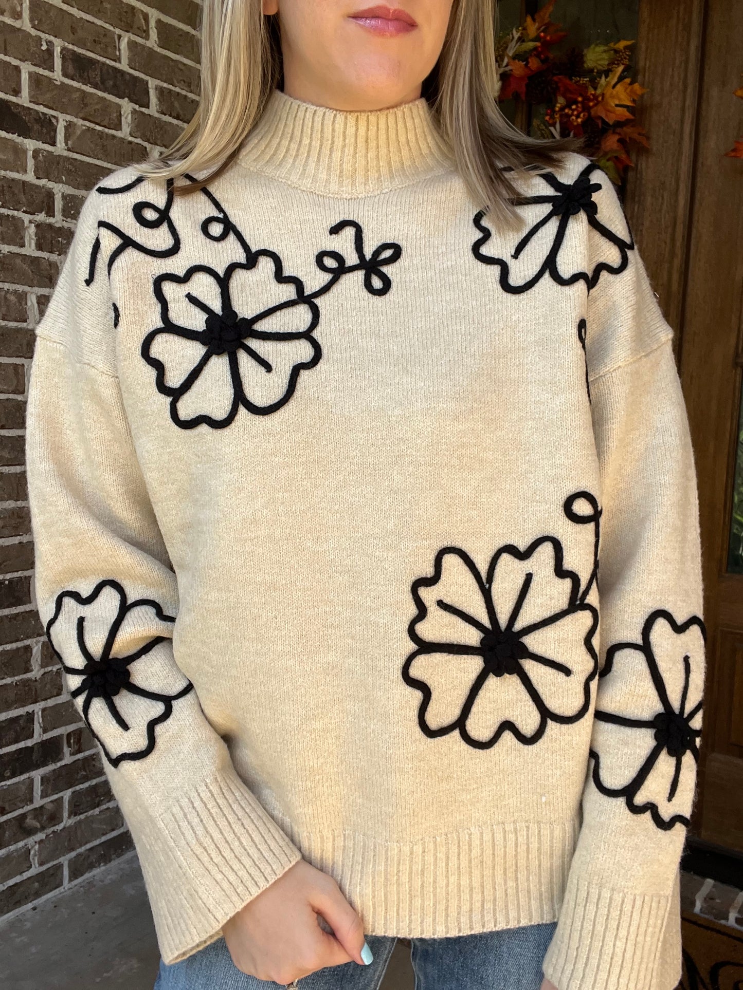 Natural sweater with flowers
