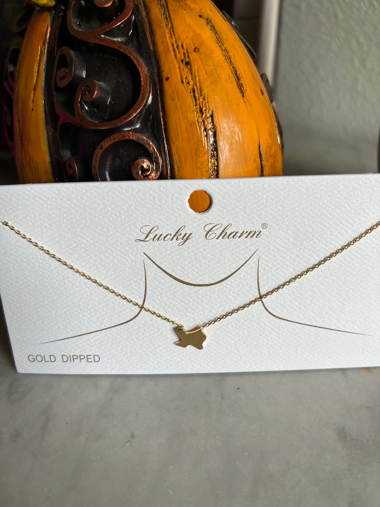 Gold state necklaces