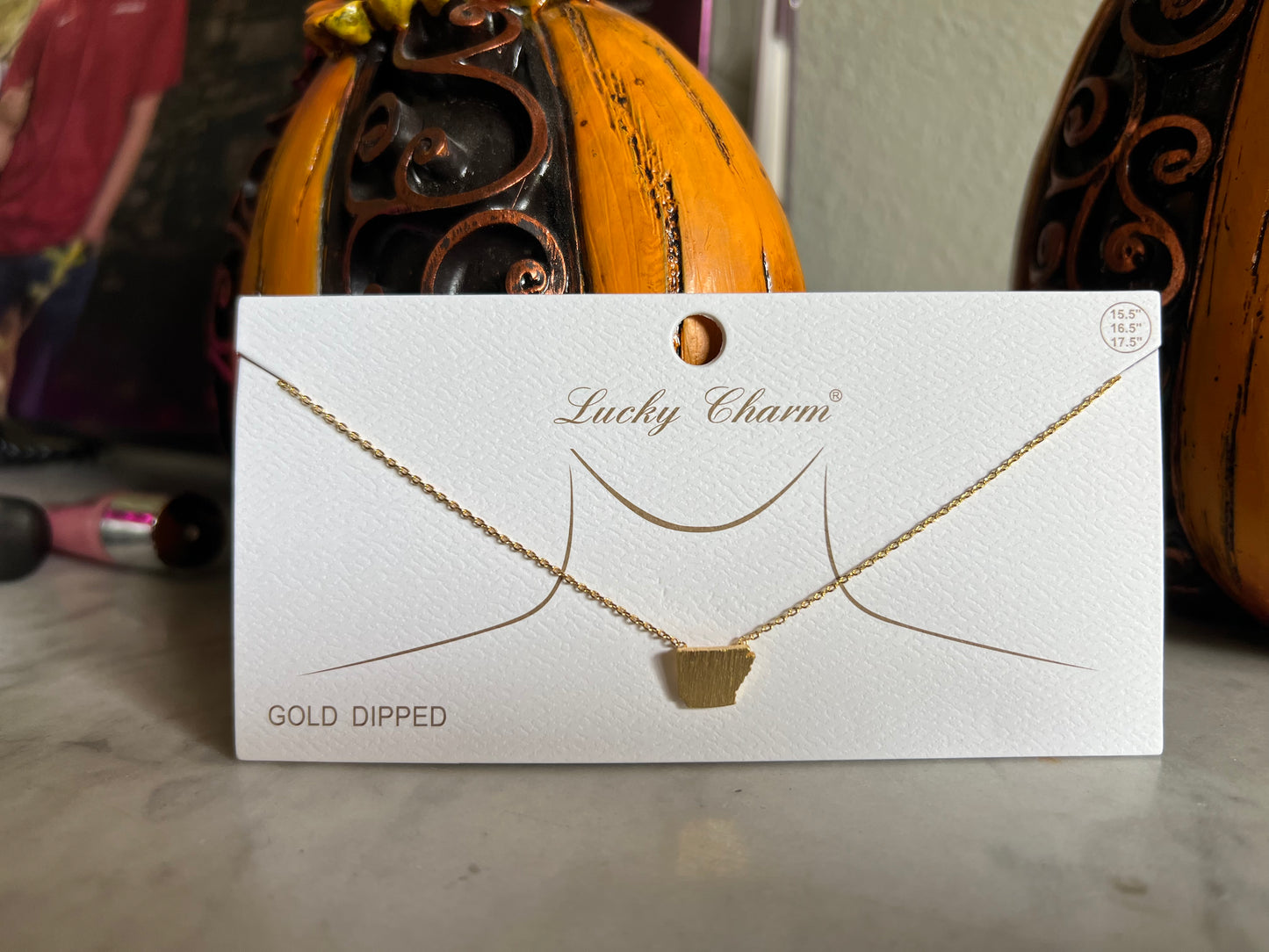 Gold state necklaces