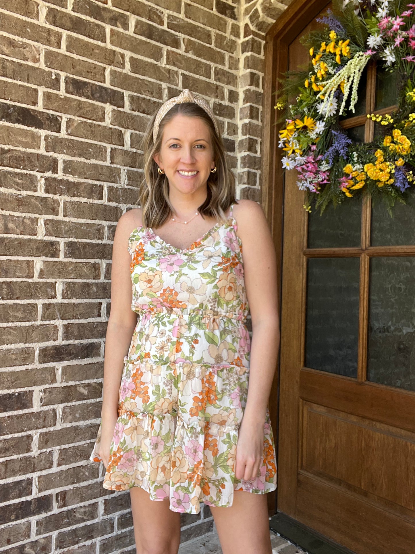 Floral romper- pink/ orange