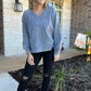 WASHED V NECK EXPOSED SEAM LONG SLEEVE TOP
