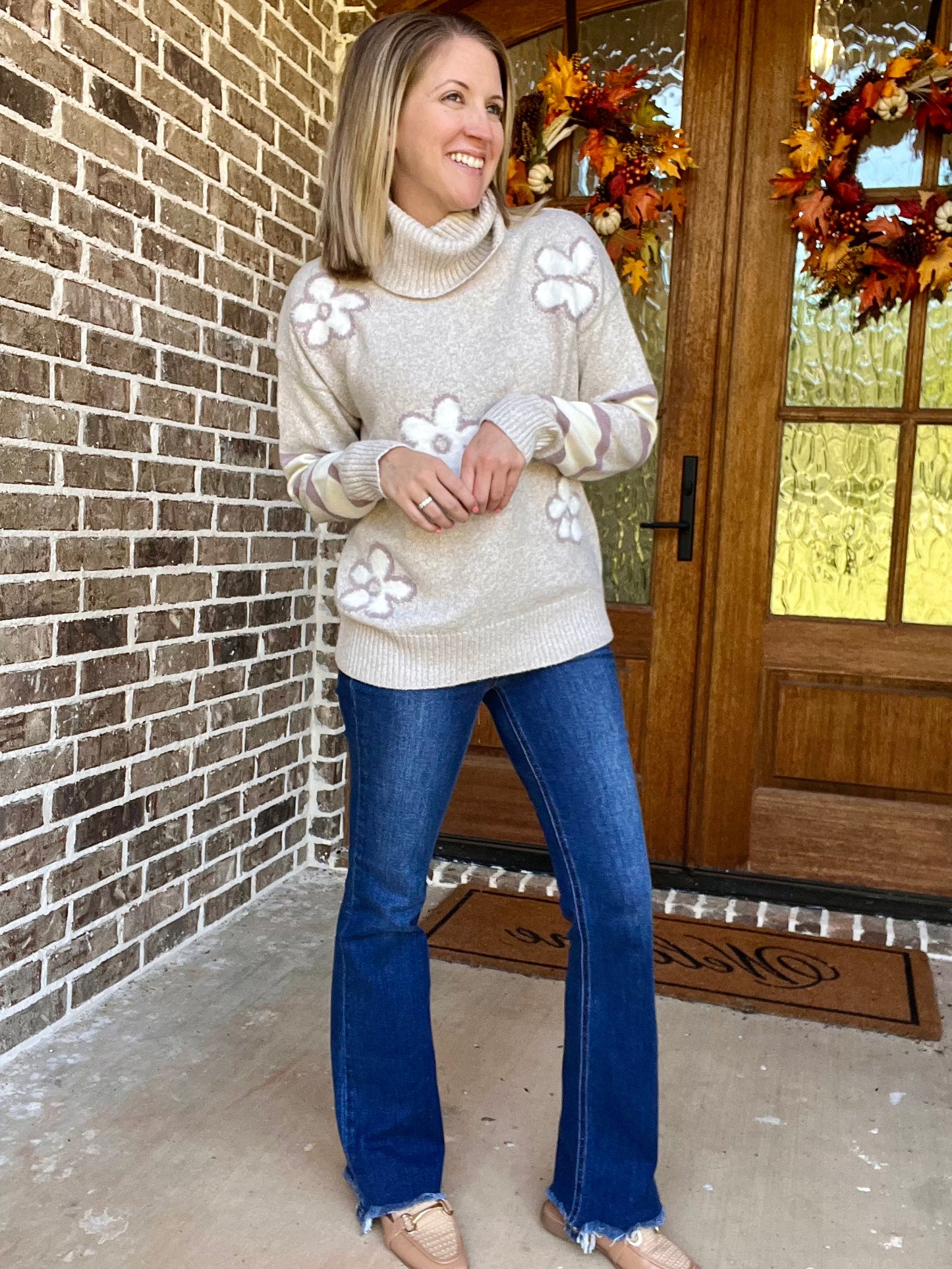 Floral and stripe motif sweater