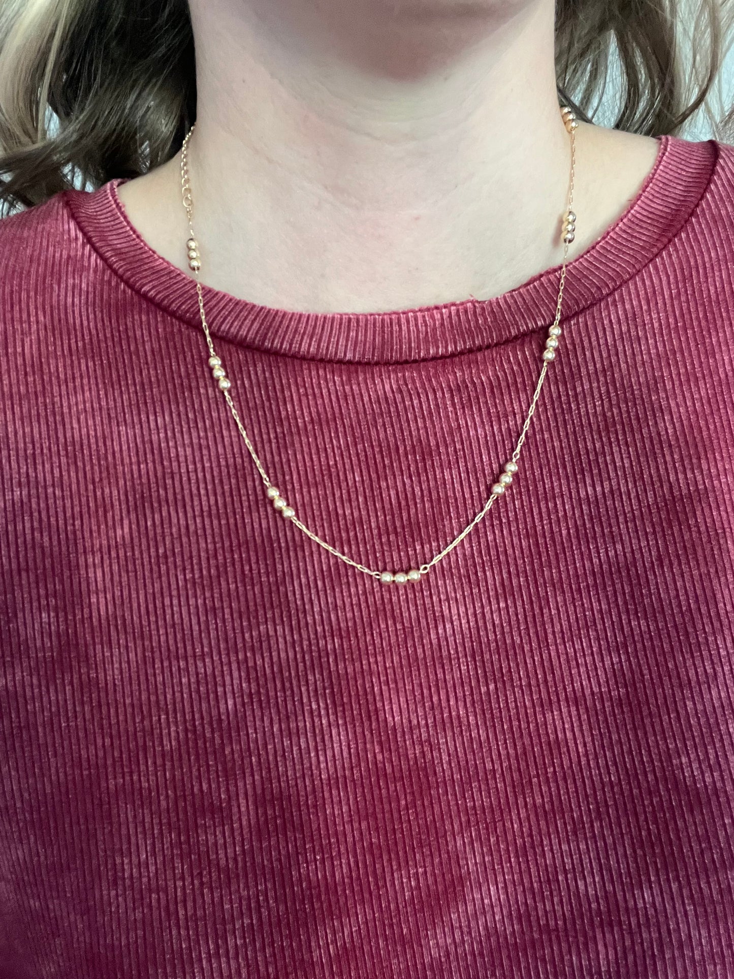 Simple gold beaded necklace