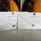 Gold state necklaces