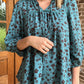 Teal floral print ruffle neck top