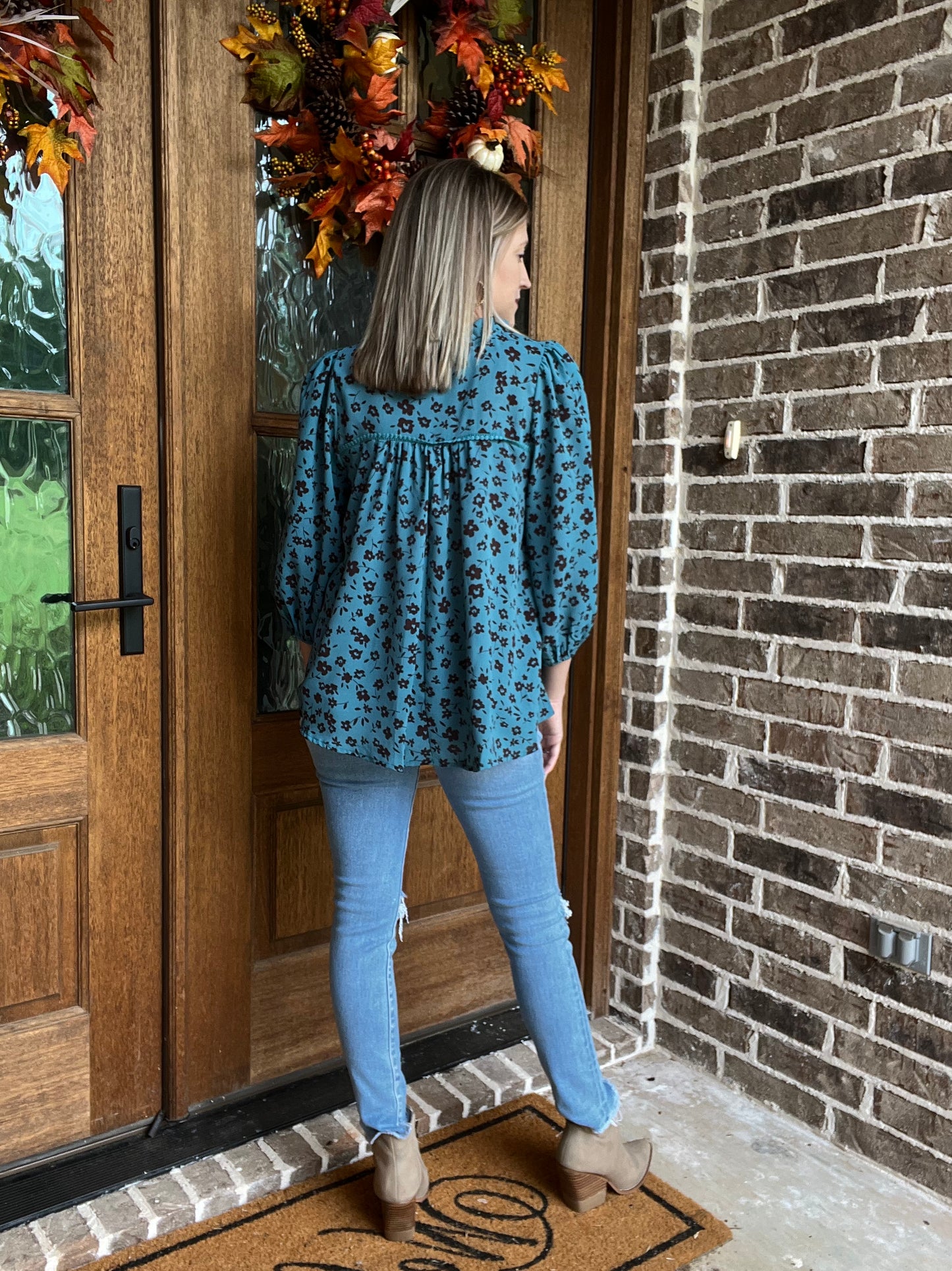 Teal floral print ruffle neck top