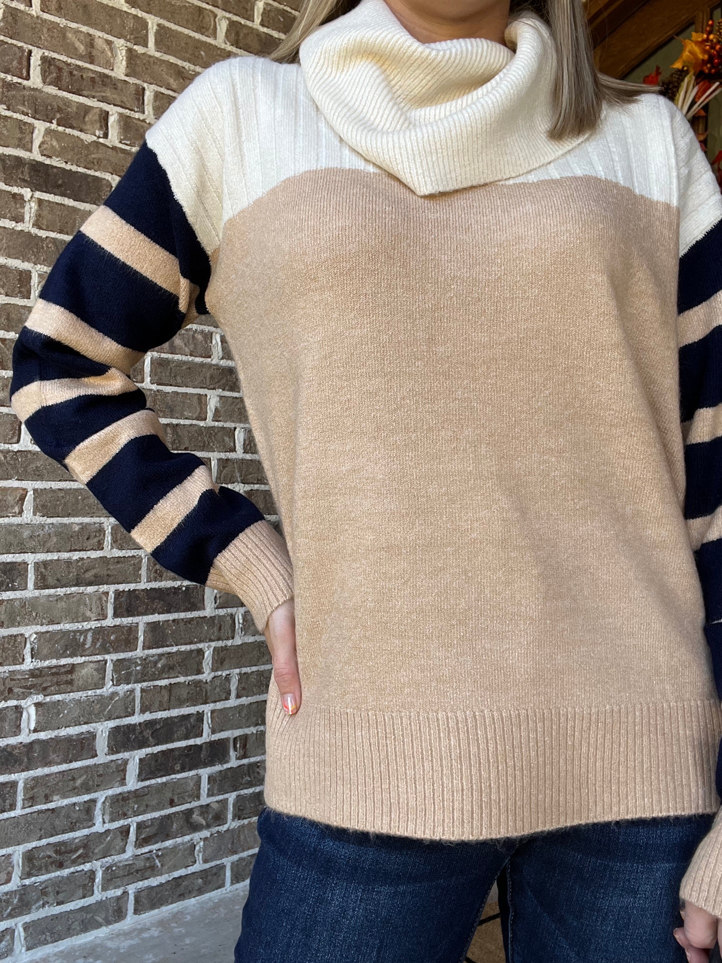 Faith funnel neck sweater with stripe sleeves