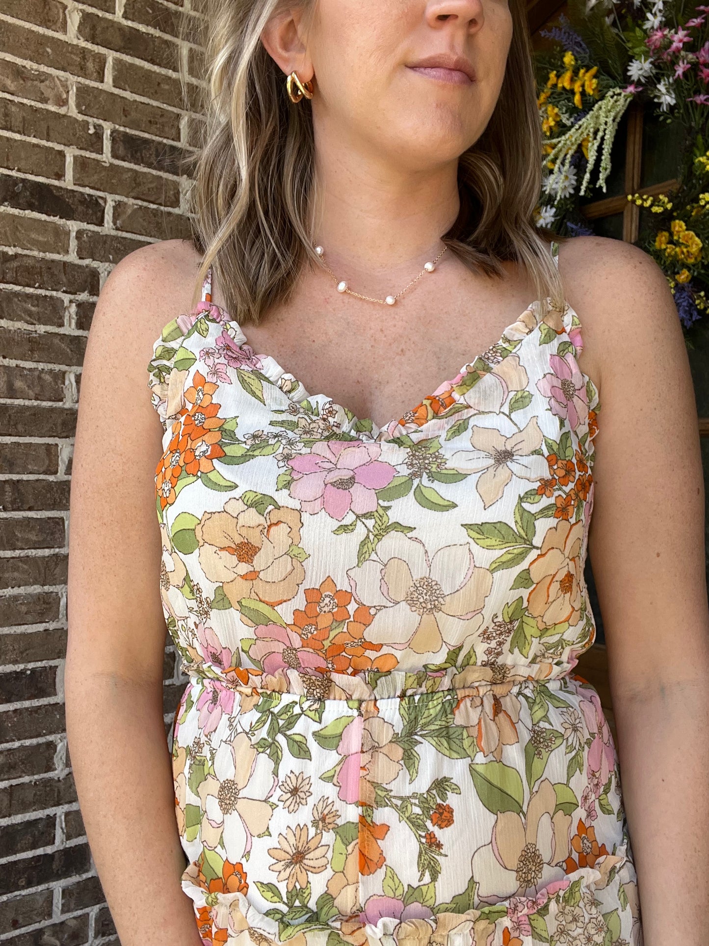 Floral romper- pink/ orange