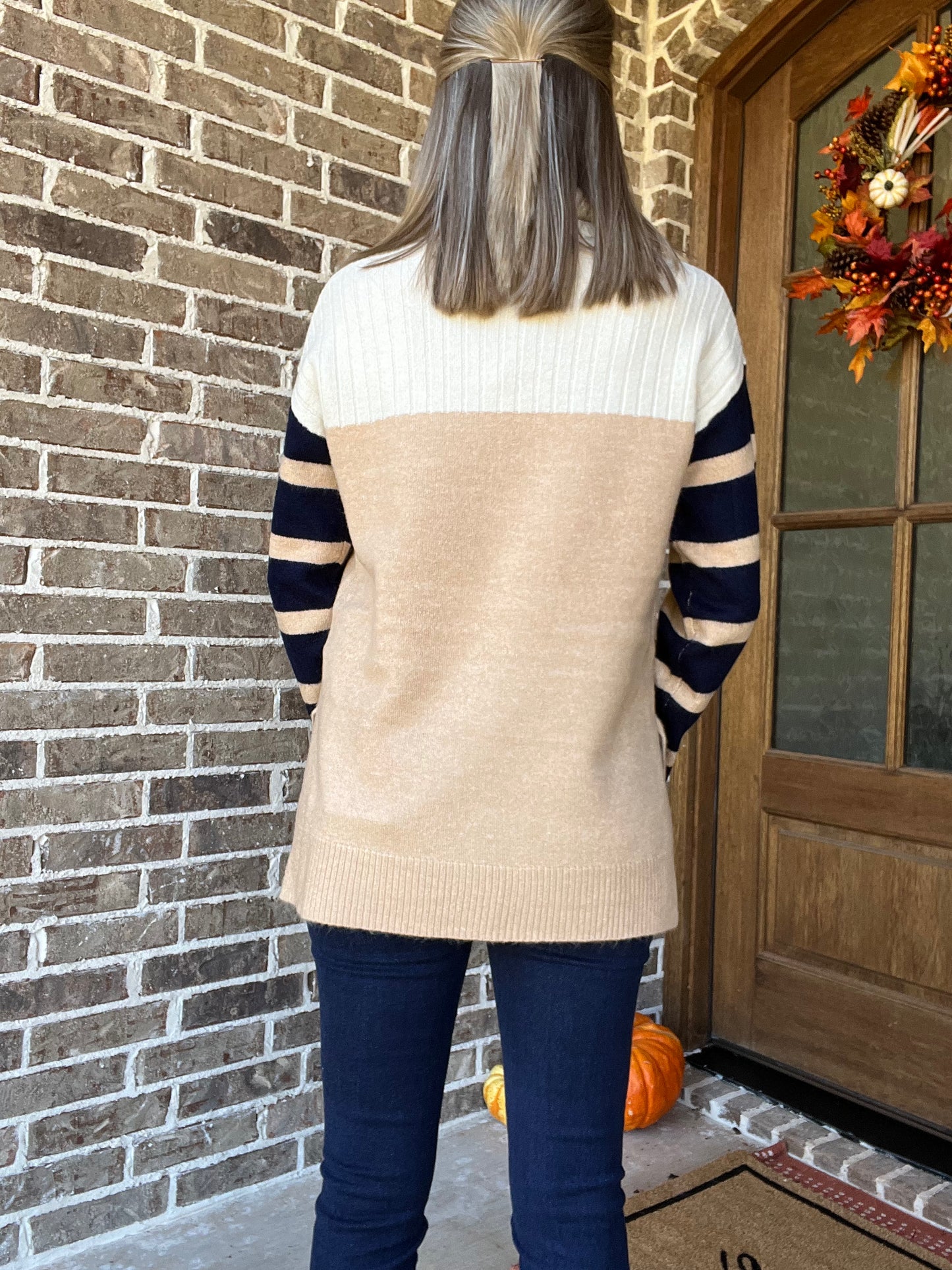 Faith funnel neck sweater with stripe sleeves