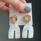 Gold and white earrings