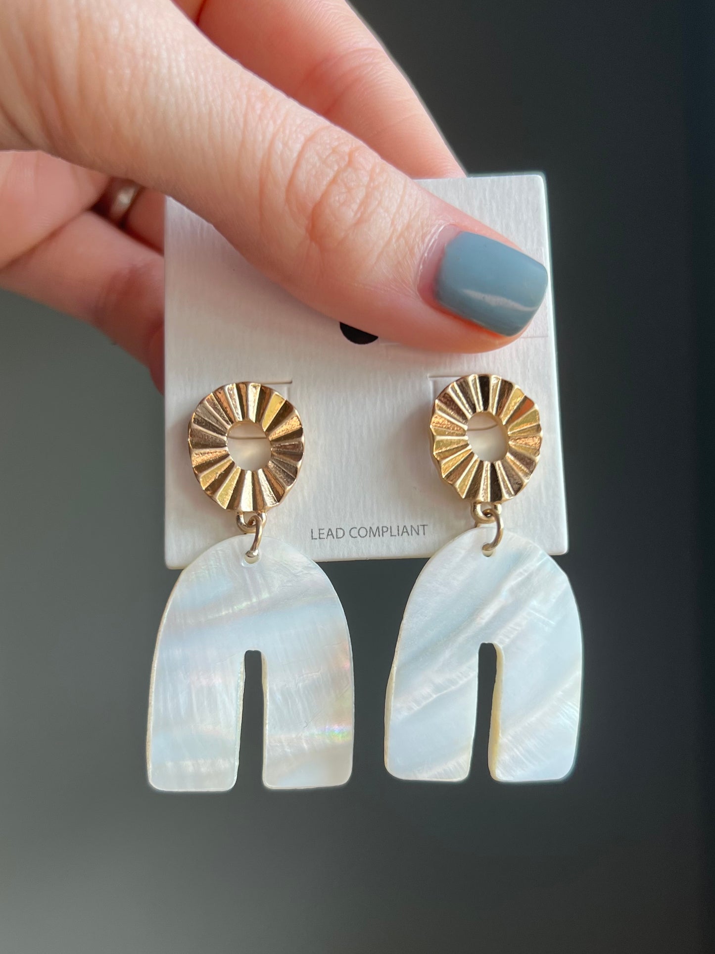 Gold and white earrings
